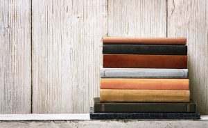 old book shelf blank spines cover, wood texture background, knowledge