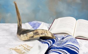 shofar with prayer shawl